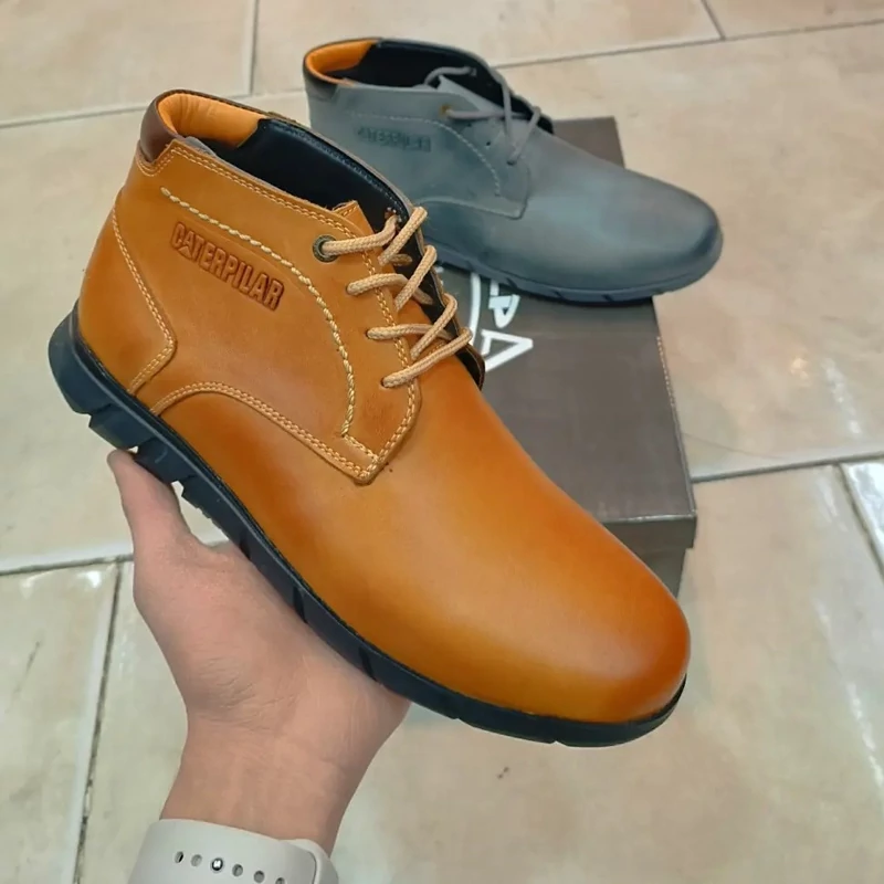 نیم بوت چرم کاترپیلار زیره لاستیک در دورنگ طوسی  عسلی خاص